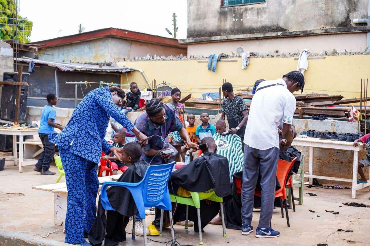 KuulKut cape held up by kids at community day